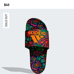 Size 7 women’s Adidas Slides Never Worn